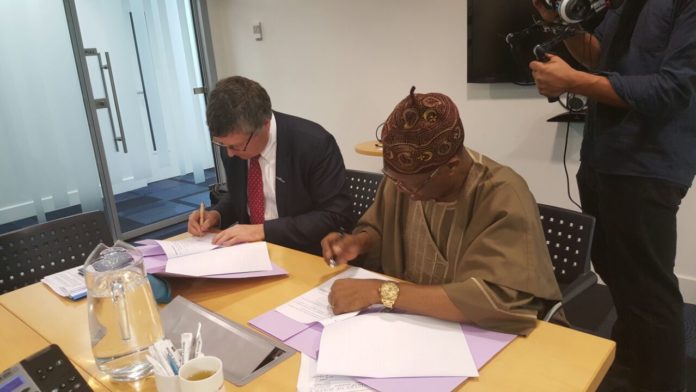 Minister of Information and Culture Lai Mohammed and Sir Ciaran Devane Minister of Information and Culture Lai Mohammed and Sir Ciaran Devane