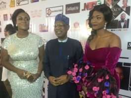 The Minister of Information and Culture, Alhaji Lai Mohammed, flanked by Aisha Mohammed, a movie producer and actress, and Josephine Ramos