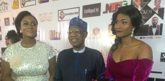 The Minister of Information and Culture, Alhaji Lai Mohammed, flanked by Aisha Mohammed, a movie producer and actress, and Josephine Ramos