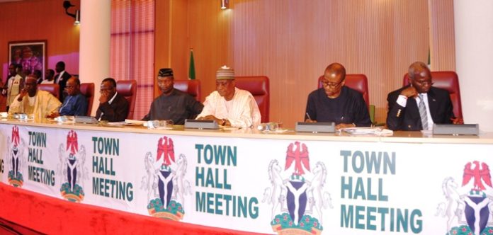 Fashola and other Ministers at the town hall meeting in Abuja
