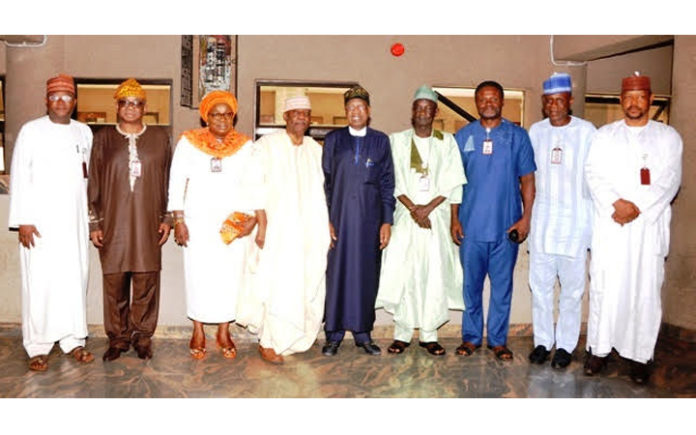Fmic NTA New Board Minister of Information and Culture, Alhaji Lai Mohammed, with the new board members of the Nigerian Television Authority (NTA), at their inauguration in Abuja on Tuesday.