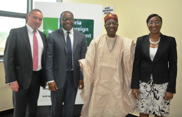 The Minister of Information and Culture, Alhaji Lai Mohammed (second right), in a group photograph with the management of the Nigeria Sovereign Investment Authority when the Minister visited the corporate headquarters of the Authority in Abuja on Monday.