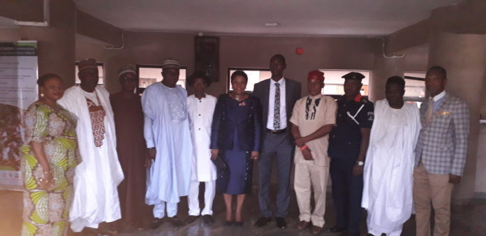PS Service Welfare Office, Mrs. Didi Walson-Jack(m) in a group photograph with the Main Organising Committee Members of the 37th edition of the annual public service games during their inauguration in Abuja.