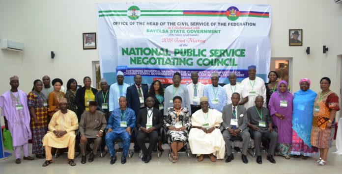 The Chairman of Council and Permanent Secretary Service Welfare Office, OHCSF, Mrs Didi Walson-Jack(Seated 4th R) in a group Photography with delegates at the 2018 Meeting of JNPSNC, in Yenagoa, Bayelsa State.