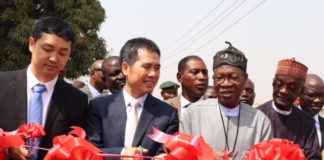 The Minister of Information and Culture, Alhaji Lai Mohammed (second from right); The Chinese Ambassador to Nigeria, Dr. Zhou Pingjian (second from left); Chief Executive Officer of NTA-StarTimes, Mr. Justin Zhang (extreme left) and the Director General of NTA, Mallam Yakub Ibn Mohammed (extreme left), at the launch of the Access to Satellite TV for 1,000 villages in Nigeria in Kpaduma, FCT, on Monday.