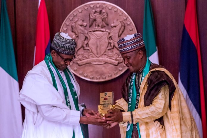 Miyetti 2 Miyetti 2: President Buhari receives a presentation from MACBAN National President Alhaji Muhammadu Kiruwa as he receives in audience Leadership of Miyetti Allah Cattle Breeders Association of Nigeria (MACBAN) in State House on 18th Jan 2019