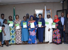 HCSF, Mrs. winifred Oyo-Ita (6th R), PS, SWO, Mrs. Walson-Jack (5th R), PS SPSO, Dr. Ajani Magdalene, the CEOs from MDIs in the OHCSF and other top management officials in the OHCSF in a group photograph