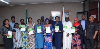 HCSF, Mrs. winifred Oyo-Ita (6th R), PS, SWO, Mrs. Walson-Jack (5th R), PS SPSO, Dr. Ajani Magdalene, the CEOs from MDIs in the OHCSF and other top management officials in the OHCSF in a group photograph