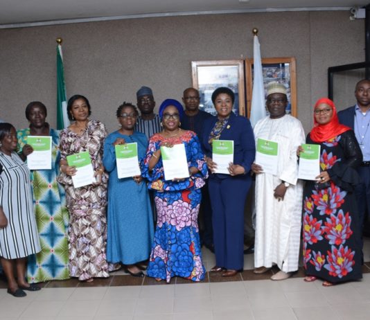 HCSF, Mrs. winifred Oyo-Ita (6th R), PS, SWO, Mrs. Walson-Jack (5th R), PS SPSO, Dr. Ajani Magdalene, the CEOs from MDIs in the OHCSF and other top management officials in the OHCSF in a group photograph