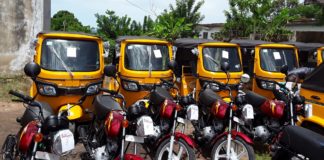 Some of the tricycles and motorcycles distributed to the youths of Ondo Central Senatorial District in Akure, on Monday.