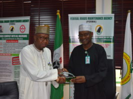 R -L, MD/CEO, FERMA, Engr. Nuruddeen A. Rafindadi, FNSE, presenting crystal plaque to the Ag. MD/CEO, FHA Umar S. Gonto during FHA’s courtesy call to FERMA