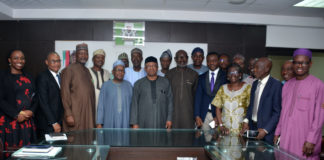 The Honourable Minister of Health, Dr. Osagie Ehanire (5th from left); the Permanent Secretary, Mr. Abdulaziz Mashi Abdullahi (4th from left) in a group with JOHESU members during a courtesy call in Abuja.