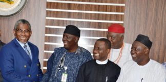 Minister of Mines and Steel Development, Arch. Olamilekan Adegbite, shaking hand with immediate past MAN’s President, Alhaji Shehu Sani while Minister of State, Dr.Uchechukwu Ogah and MAN’s President, Alhaji Kabir Mohammadu Kankari, look with delight during MAN’s National Executives courtesy visit to his office on Tuesday, 3rd September, 2019.