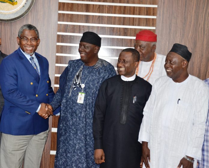 ciC Minister of Mines and Steel Development, Arch. Olamilekan Adegbite, shaking hand with immediate past MAN’s President, Alhaji Shehu Sani while Minister of State, Dr.Uchechukwu Ogah and MAN’s President, Alhaji Kabir Mohammadu Kankari, look with delight during MAN’s National Executives courtesy visit to his office on Tuesday, 3rd September, 2019.