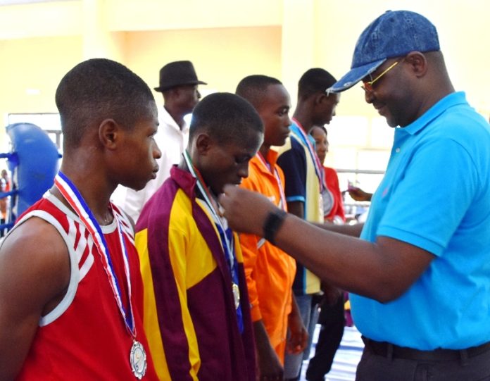 Honourable Minister of Youth and Sports Development, Mr Sunday Dare with Athletes