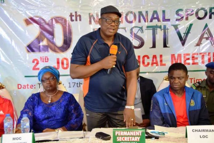 The Permanent Secretary of FMYSD, Mr Adesola Olusade in the middle, The Deputy Governor of Edo State, Comrade Philip Shuaibu, Right and Secretary of MOC, Mrs Hauwa Kulu Akinyemi left during the 2nd Joint Technical Meeting of the 20th National Sport Festival in Benin-City, on 17th Dec, 2019 at Prestige Hall, Edo State.