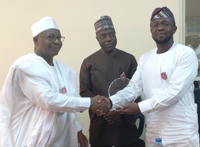 Director(Human Resource Management), El Baff Mahdi, Permanent Secretary, Ministry of Communications and Digital Economy, Musa Istifanus and newly appointed Permanent Secretary, Mr. Tope Fashedemi during a send forth organized by the staff of the e-government department at the Ministry’s Headquarters, Abuja