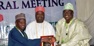 L-R: Engr. Habu Gumel, President Nigeria Olympic Committee ( NOC) presenting an award to the Hon. Minister, Mr Sunday Dare; ably represented by Mr Adesola Olusade, Permanent Secretary of the Ministry; at the Annual General Meeting of the Nigeria Olympic Committee (NOC) held in Gwarimpa, Abuja. The Plaque award was in recognition of the Hon. Minister's zeal and commitment to the timely completion of the Headquarter/Secretariat Building of the Association of National Olympic Committees of Africa ( ANOCA) in the F.C.T, Abuja.