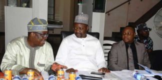 Middle:: Minister of Youth and Sports Devlpt; Hon. Sunday Dare; 1st Left is the Outgoing Permanent Secretary, FMYSD, Mr. Olusade Adesola; 1st Right is the incoming Permanent Secretary, FMYSD, Mr. Gabriel Tanimu Aduda during the Town Hall Meeting of the Ministry which held @ the Package A, MKO Abiola Stadium, Abuja.