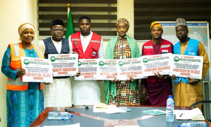 The Hon. Minister of Humanitarian Affairs Disaster Management and Social Development Sadiya Umar Farouq in a group picture with Mohakfoundation.
