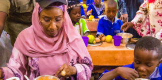 The Honourable Minister of Humanitarian Affairs, Disaster Management and Social Development, Sadiya Umar Farouq during a Home Grown School Feeding Programme.