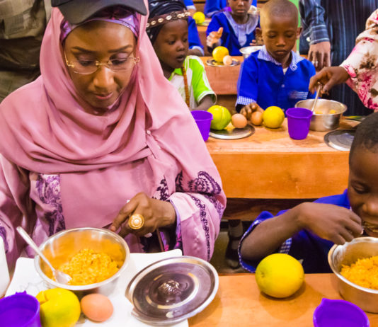 The Honourable Minister of Humanitarian Affairs, Disaster Management and Social Development, Sadiya Umar Farouq during a Home Grown School Feeding Programme.