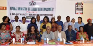 The representative of Permanent Secretary, Federal Ministry of Labour and Employment, Mr. Emmanuel Igbinosu (centre) flanked on the left by former Director Inspectorate Department of the Ministry Mrs. Amahian Jegbefumen and on the right by the Ag. Director, Inspectorate, Mr. Ajuwon Dauda and other participants of a Capacity Building workshop on Gender Mainstreaming in Workplace