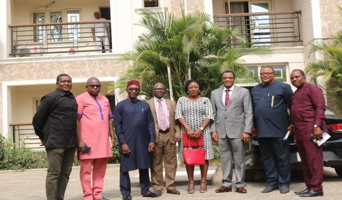 The Perm. Sec. Federal Ministry of Environment Dr. Bakari Wadinga 3rd from right and on his immediate left is the head of Human Resources in the Council who is also overseeing the Council, Mr. Victor Mba while at the extreme right is the head, Media and Public Communications, Mr. Kehinde A. Openibo, on the immediate right of the Perm. Sec is the Personal Assistant, Gloria Balat, the head of DRESE in the Council , Dr. Andy Ukah, the Council’s Accountant Mr. Abubakar Adamu, the Special Assistant to the Permanent Secretary , Mr. Adegoke Emmanuel, all posed for picture taking during the Courtesy visit to the Council