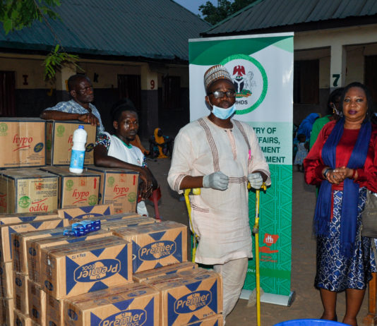 Right; the Representative of the Minister of Humanitarian Affairs, Disaster Management and Social Development, Director Rehabilitation, Nkechi Onwukwe