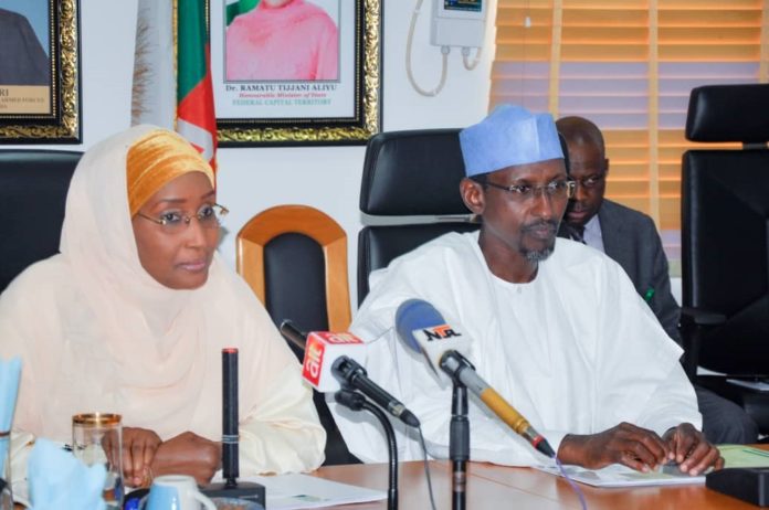 MINISTER OF FMHADMSD AND FCT MINISTER From Left the Hounourable Minister of Humanitarian Affairs, Disaster Management and Social Development, Hajiya Sadiya Umar Farouq and the Minister of the Federal Capital Territory (FCT) Alhaji Mohammad Musa Bello (right).