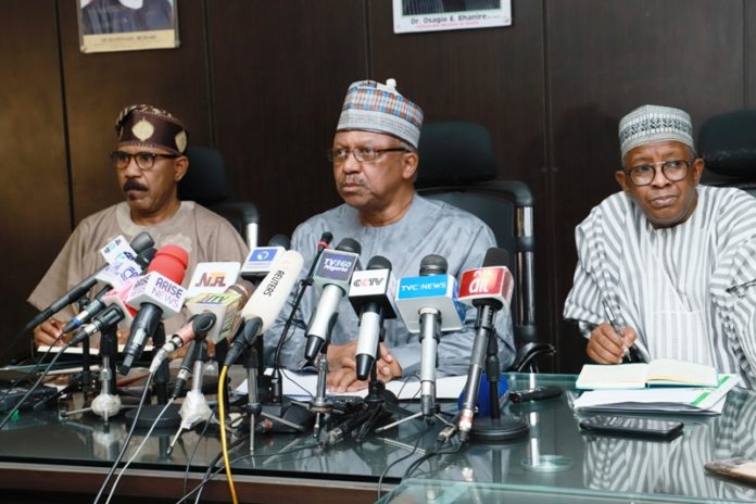 The Honourable Ministry of Health. Dr. Osagie Ehaneri (C), the Honourable Minister of State, Health, Dr. Olurunnimbe Mamora
