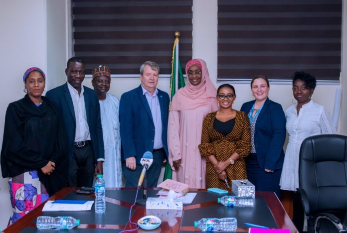 UNICEF GROUP PHOTO WITH HM Honourable Minister of Humanitarian Affairs, Disaster Management and Social Development, Hajiya Sadiya Umar Farouq (4th right); Country Representative of UNICEF, Peter Hawkins (4th left), and other members of the Ministry and UNICEF