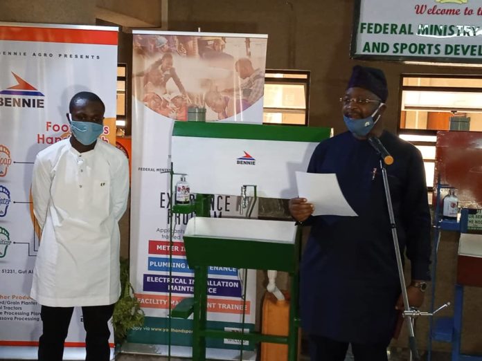 HM Suday Dare and the inventor of the Hand Sanitizer Machine Mr Jerry Mallo from Jos, Plateau state.