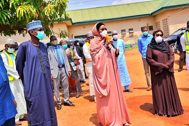 FCT HANDOVER OF PALLIATIVES Middle: The Honourable Minister of Humanitarian Affairs, Disaster Management and Social Development, Sadiya Umar Farouq, Left; the Honourable Minister of FCT, Alhaji Muhammad Musa Bello, and Right; The Honourable Minister of State for FCT, Ramatu Tijjani Aliyu,