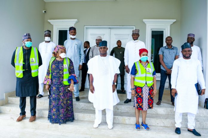 KOGI STATE HANDOVER 2nd Left; The representative of the Honourable Minister of Humanitarian Affairs, Disaster Management and Social Development (Head of Special Duties, of the Ministry, Nadia Muhammed-Soso) 3rd left; the Executive Governor of Kogi State, His Excellency, Yahaya Bello