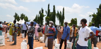 The parents of the beneficiaries of the Home Grown School Feeding Programme, during the flag off for the modified Home Grown School Feeding Programme in Kuje, FCT. Photo by Khalid Ahmed