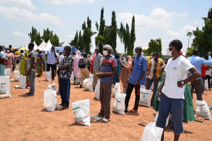 DSC_1599 The parents of the beneficiaries of the Home Grown School Feeding Programme, during the flag off for the modified Home Grown School Feeding Programme in Kuje, FCT. Photo by Khalid Ahmed