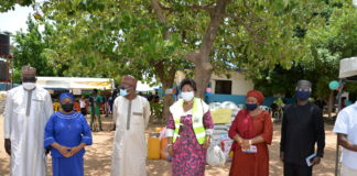 (3rd left) Representative of the Honourable Minister of Humanitarian Affairs, Disaster Management and Social Development, the Special Adviser on Humanitarian Affairs, Alhaji Musa Bungudu; (4th left) Director Disaster Management of the ministry, Dr Dorathy Nwodo, (5th left) Head of Special Duties of the ministry, Nadia Soso-Muhammed, President of the Coalition of Orphanages and Children Homes in Abuja, Senator Eze Ajoku, (1st left) Representative of the Chairman Gwagwalada Area Council Honourable Mohammed Kassim and (2nd left), General Coordinator ANAWIM Home (poorest of the poor) Reverend Sister Oresoa-Selo Ojeme, during the flag off of distribution of palliatives to orphanage homes in FCT
