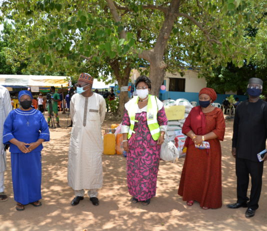 (3rd left) Representative of the Honourable Minister of Humanitarian Affairs, Disaster Management and Social Development, the Special Adviser on Humanitarian Affairs, Alhaji Musa Bungudu; (4th left) Director Disaster Management of the ministry, Dr Dorathy Nwodo, (5th left) Head of Special Duties of the ministry, Nadia Soso-Muhammed, President of the Coalition of Orphanages and Children Homes in Abuja, Senator Eze Ajoku, (1st left) Representative of the Chairman Gwagwalada Area Council Honourable Mohammed Kassim and (2nd left), General Coordinator ANAWIM Home (poorest of the poor) Reverend Sister Oresoa-Selo Ojeme, during the flag off of distribution of palliatives to orphanage homes in FCT