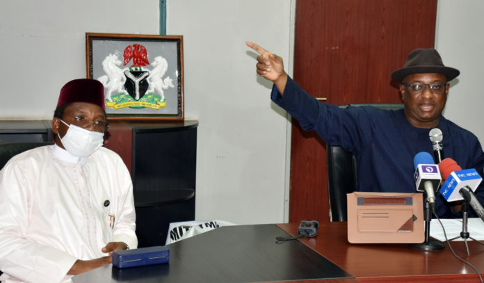 The Honourable Minister Of State, Labour and Employment, Festus Keyamo, SAN and Director General, National Directorate of Employment (NDE) Dr. Nasiru Ladan Argungu, during the Virtual Inauguration of the State’ Selection Committees of the Extended Special Public Works Programme in Abuja