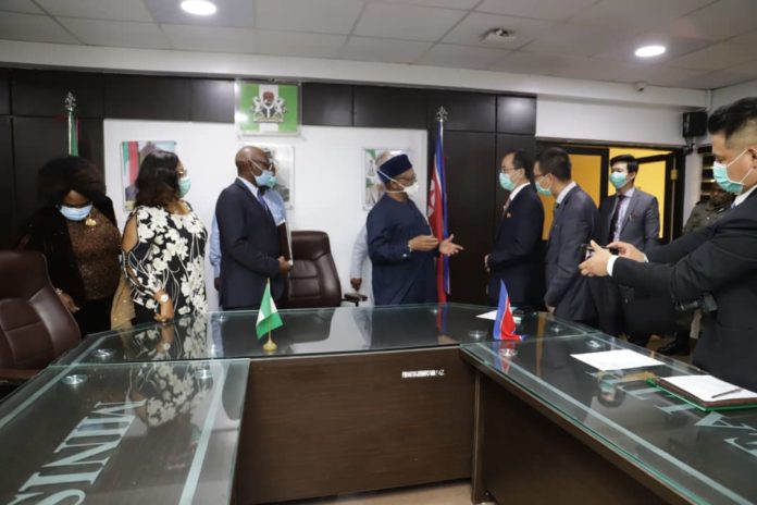 Honourable Minister of Health Dr. Osagie Ehanire signing the MOU on Health with PDRK