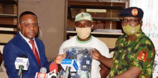 Left to Right is Mr Gabriel Aduda, Permanent Secretary of the Ministry, representing the Hon. Minister at the event; Dr. Vincent Chidera, Corps Member & Leader of Team that produces the Face Mask & the D.G NYSC, Brig.Gen. Ibrahim Shuaibu; during its Launching at the Foyer Hall of the Ministry