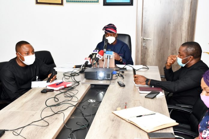 Occasion of the Inauguration of Ministerial Technical Committee On the Establishment of the Nigeria Youth Investment Fund ( NYIF) on Tuesday, 11th August 2020. Minister of Youth & Sports Devlpt. Mr Sunday Dare, addressing the Committee members during the Virtual meeting of inauguration. Seated on his left is the Permanrnt Secretary Mr. Gabriel Aduda: On his right is the S.A. to the Hon. Minister, Mr. Tunde Akpeji.