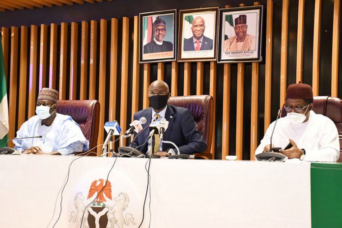 L-R: Honourable Minister of State for Works and Housing , Engr Abubakar D Aliyu , Honourable Minister of Works and Housing, Babatunde Raji Fashola SAN and Chairman – Senate Committee on Housing Dr. Sam Egwu at the event.