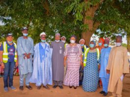 (2ND-R) Representing The Honourable Minister Of Humanitarian Affairs, Disaster Management And Social Development, Grema Ali Alhaji,(4th-R) Director Social Development, Dr Dorathy Nwodu,(4TH-L) Special Adviser to The Minister On Humanitarian Affairs, Alh. Musa Bungudu, (3RD-L) The Chief Of Barwa, Chief Monday Kogi,(1st-R) Sarkin Pada, David Bawa, (2ND-R) Sarkin Samari, Musa Giba And Others, During The International Day For The Eradication Of Poverty, Held At Barwa Community On The 17th October, 2020.