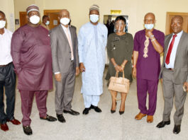 The Permanent Secretary, Federal Ministry of Labour and Employment, Dr Yerima Peter Tarfa, (4th Right) Representative of Nigeria Employers' Consultative Association (NECA), Nike Ajala (3rd Right) Director Employment and Wages, John Nyamali, (2nd Right) in a group photograph with directors and others during the meeting of the National Employment Council in Abuja