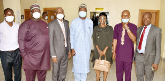 The Permanent Secretary, Federal Ministry of Labour and Employment, Dr Yerima Peter Tarfa, (4th Right) Representative of Nigeria Employers' Consultative Association (NECA), Nike Ajala (3rd Right) Director Employment and Wages, John Nyamali, (2nd Right) in a group photograph with directors and others during the meeting of the National Employment Council in Abuja