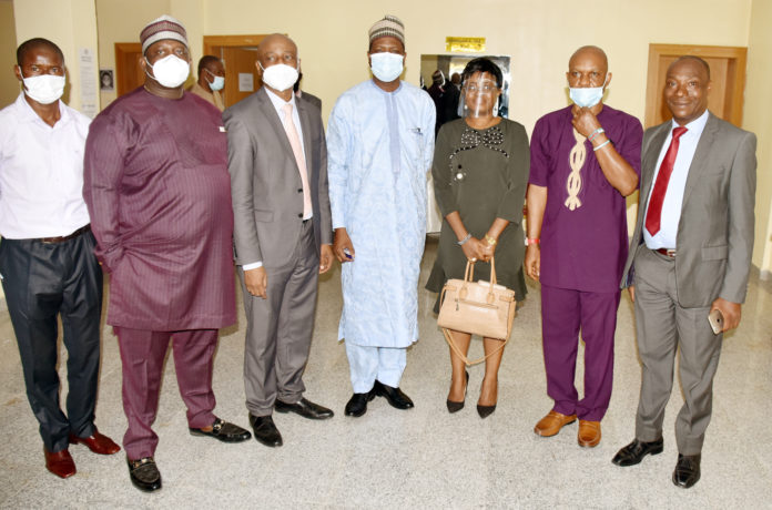 The Permanent Secretary, Federal Ministry of Labour and Employment, Dr Yerima Peter Tarfa, (4th Right) Representative of Nigeria Employers' Consultative Association (NECA), Nike Ajala (3rd Right) Director Employment and Wages, John Nyamali, (2nd Right) in a group photograph with directors and others during the meeting of the National Employment Council in Abuja The Permanent Secretary, Federal Ministry of Labour and Employment, Dr Yerima Peter Tarfa, (4th Right) Representative of Nigeria Employers' Consultative Association (NECA), Nike Ajala (3rd Right) Director Employment and Wages, John Nyamali, (2nd Right) in a group photograph with directors and others during the meeting of the National Employment Council in Abuja
