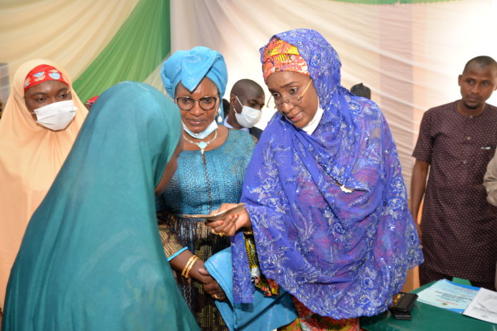 DSC_4882 (FROM RIGHT) THE HONOURABLE MINISTER OF FEDERAL MINISTRY OF HUMANITARIAN AFFAIRS, DISASTER MANAGEMENT AND SOCIAL DEVELOPMENT, SADIYA UMAR FAROUQ, MINISTER OF WOMEN AFFAIRS AND SOCIAL DEVELOPMENT, DAME PUALINE TALLEN, THE FIRST LADY OF GOMBE STATE, HAJIYA ASMAU INUWA YAHAYA, DURING THE FLAG OFF OF FEDERAL GOVERNMENT GRANT PROJECT FOR RURAL WOMEN IN GOMBE STATE, HELD AT THE BANQUET HALL OF GOMBE INTERNATIONAL HOTEL GOMBE STATE, ON THE 12TH OF NOVEMBER 2020. PHOTO: KHALID AHMED