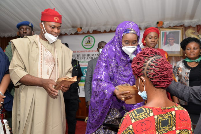 DSC_5233 (2ND LEFT) THE HONOURABLE MINISTER OF FEDERAL MINISTRY OF HUMANITARIAN AFFAIRS DISASTER MANAGEMENT AND SOCIAL DEVELOPMENT, SADIYA UMAR FAROUQ, (1ST RIGHT) REPRESENTING THE GOVERNOR OF EBONYI STATE, THE DEPUTY GOVERNOR OF EBONYI STATE, KELECHI IGWE , (1ST LEFT) COMMISSIONER FOR HUMAN CAPITAL, HONOURABLE MISS ANN ALIGWE,(2ND LEFT) AMA NNACHI, DURING LAUNCH OF THE FEDERAL GOVERNMENT GRANT FOR THE RURAL WOMEN IN EBONYI STATE, AT THE OLD GOVERNMENT HOUSE EBONYI, ON THE 19TH NOVEMBER,2020. PHOTO: KHALID AHMED